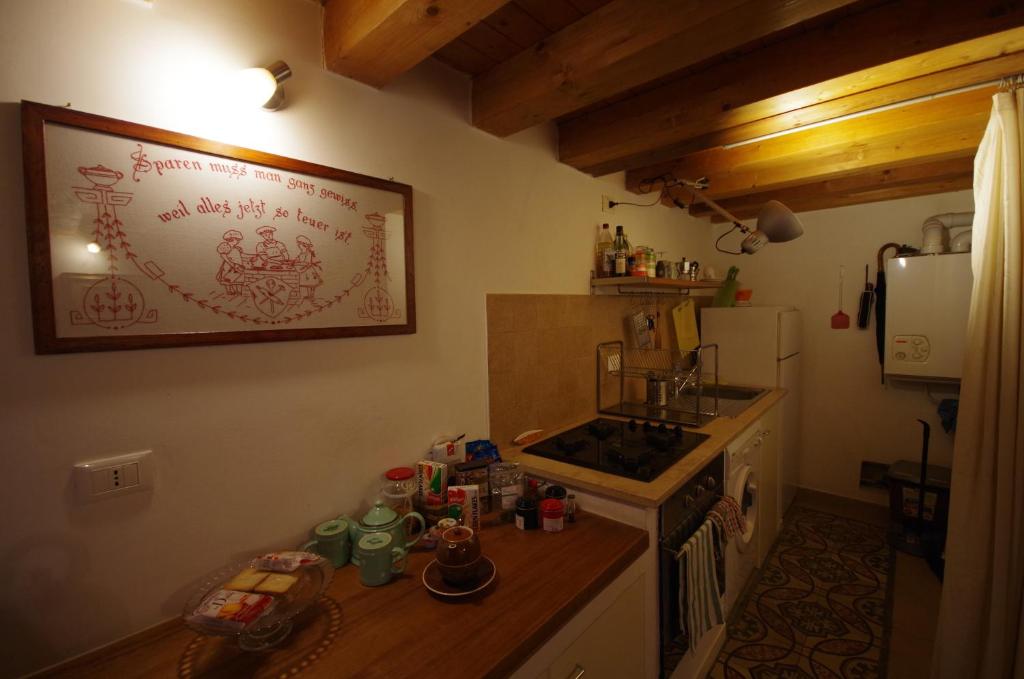 A kitchen or kitchenette at Piazzetta Santa Barbara