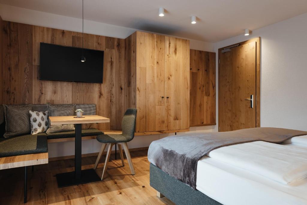 Postel nebo postele na pokoji v ubytování Hotel Pradat
