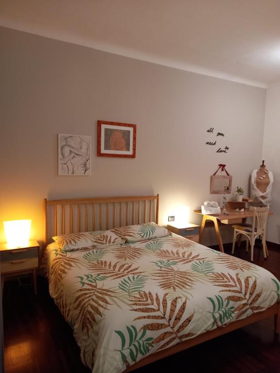 Posteľ alebo postele v izbe v ubytovaní Delizioso Appartamento In Centro
