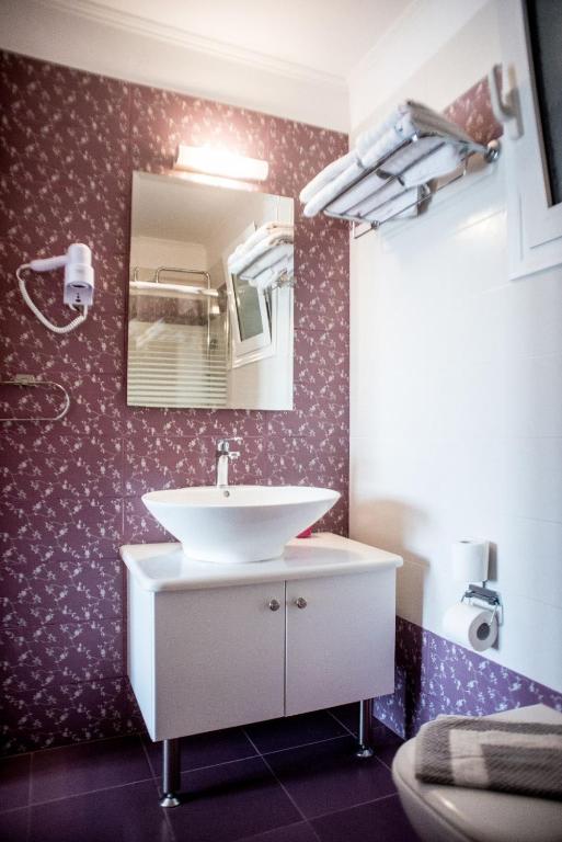 Koupelna v ubytování Elektra Hotel
