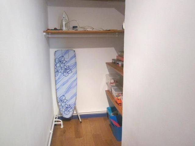 a surfboard sitting on a shelf in a room at Appartement La petite Résie in La Résie-Saint-Martin
