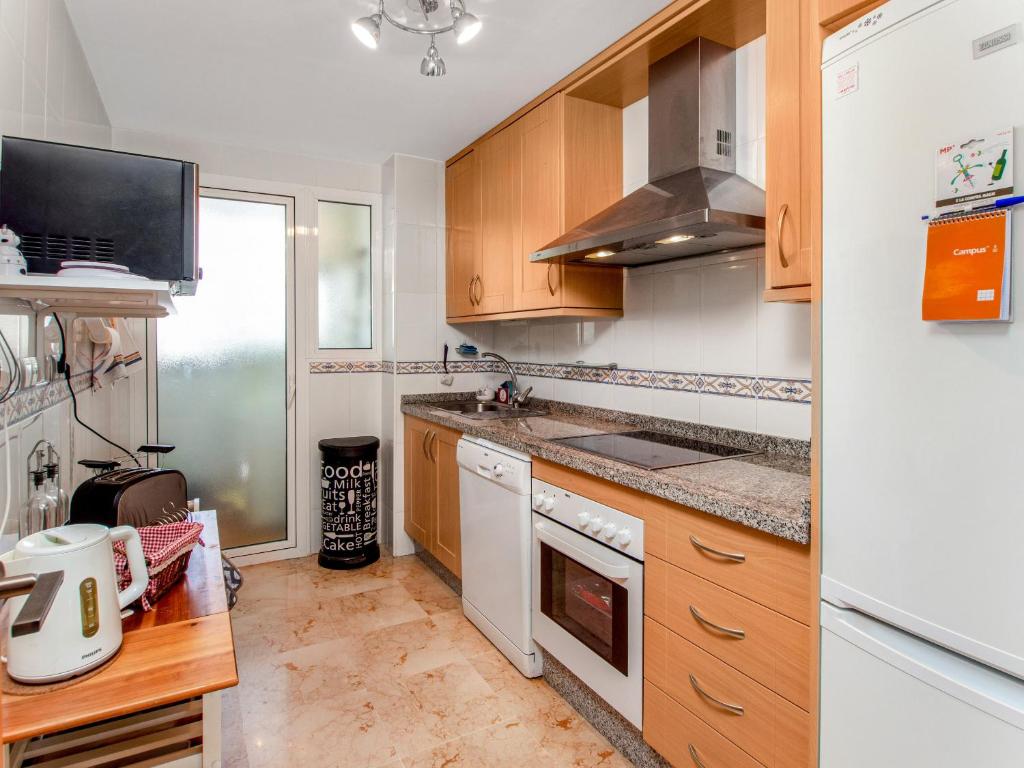 Kuchyň nebo kuchyňský kout v ubytování 2091- Apt close from all amenities