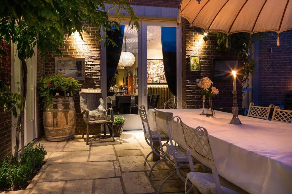 Patio nebo venkovní prostory v ubytování B&B Domaine Villa Bayard