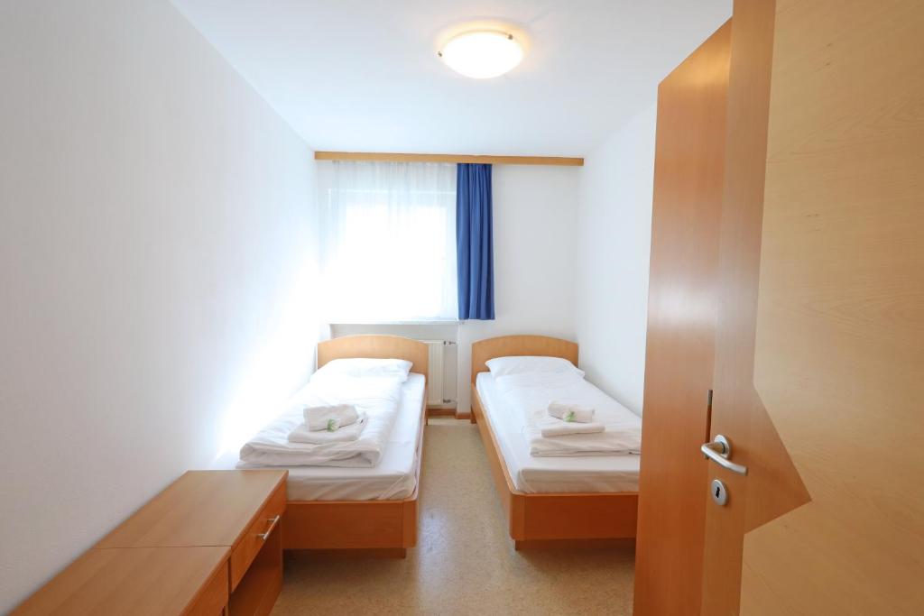 Postel nebo postele na pokoji v ubytování Residence Sonneck