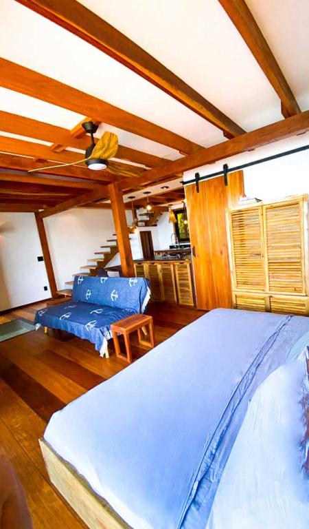 Postel nebo postele na pokoji v ubytování Bahia Coral Lodge