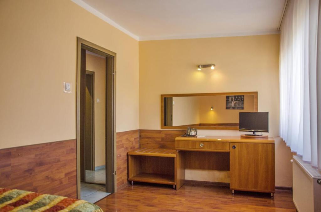 Posteľ alebo postele v izbe v ubytovaní Hotel Skaut