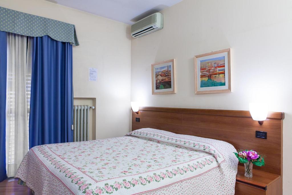 Posteľ alebo postele v izbe v ubytovaní Hotel San Marco