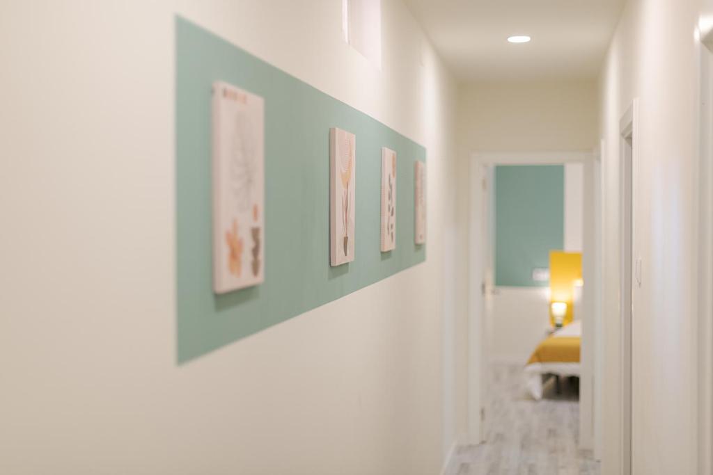 Posteľ alebo postele v izbe v ubytovaní ROOMMY