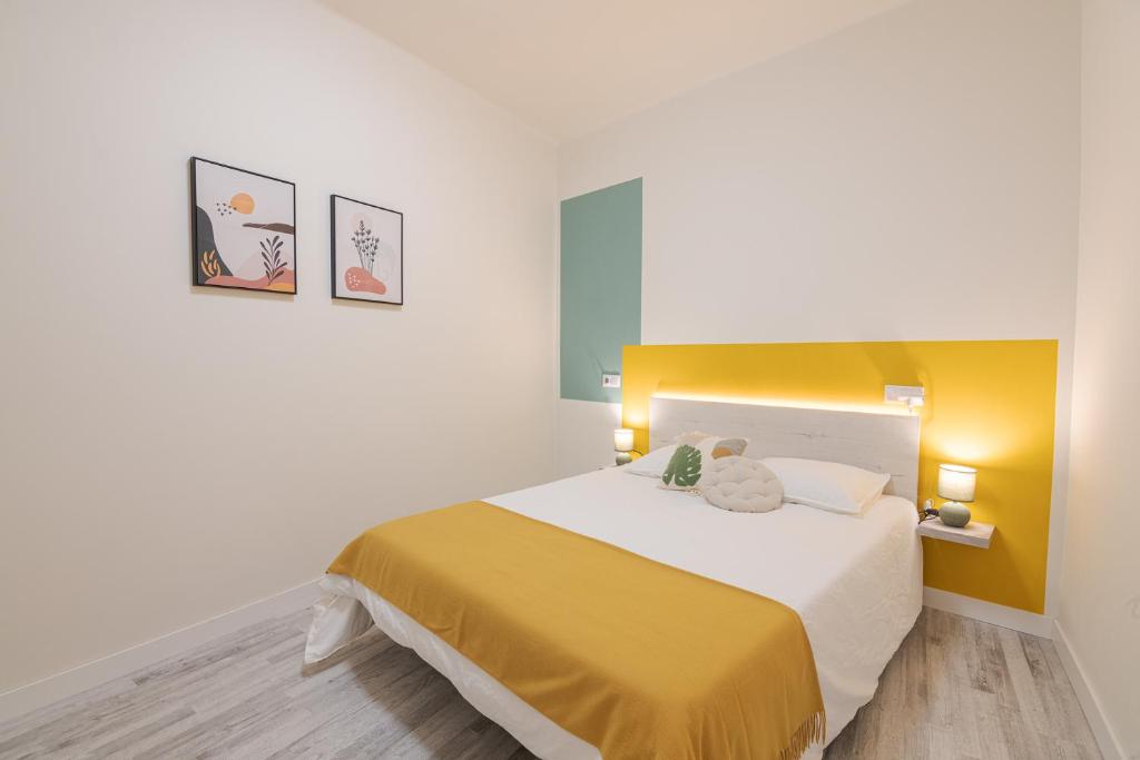 Posteľ alebo postele v izbe v ubytovaní ROOMMY