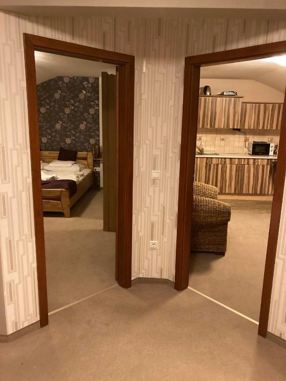 Postel nebo postele na pokoji v ubytování Atryum Hotel