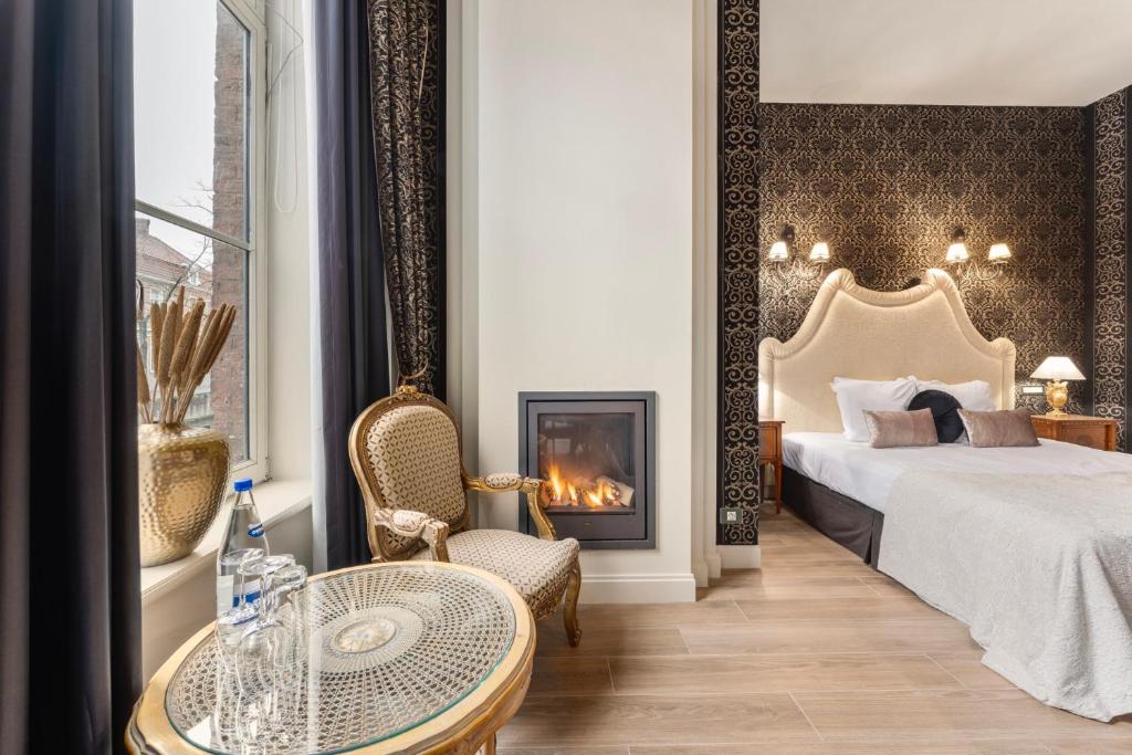 Postel nebo postele na pokoji v ubytování Canal Suites