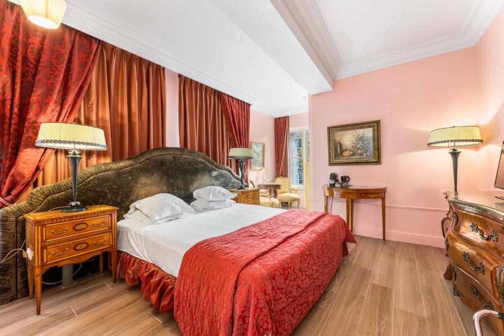 Säng eller sängar i ett rum på Canal Suites
