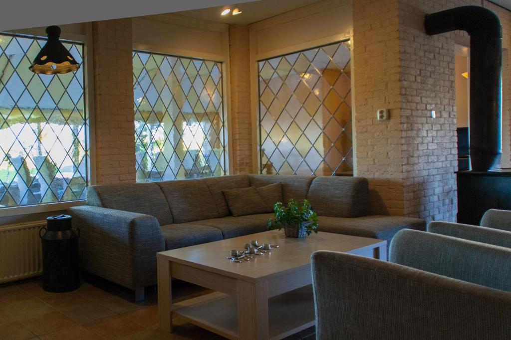 Posezení v ubytování Hotel Bos en Duinzicht