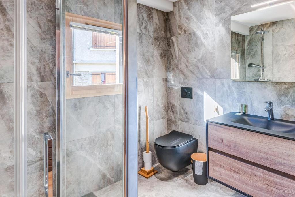 Kúpeľňa v ubytovaní Le Hameau des Cimes - Welkeys