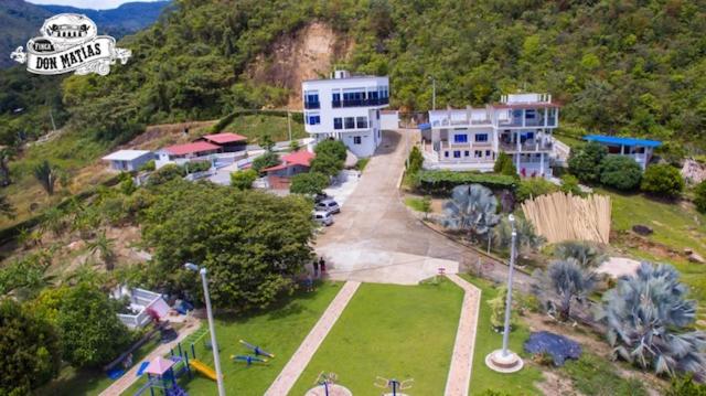 an aerial view of a house on top of a hill at Finca Don Matías in Melgar