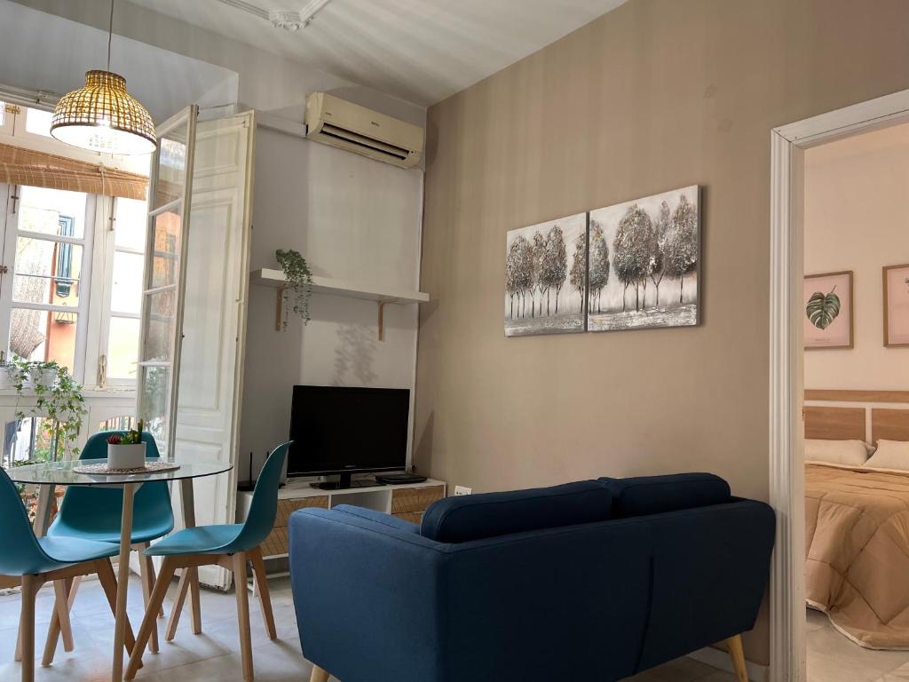 Televízia a/alebo spoločenská miestnosť v ubytovaní iYOURBASICS Great Apartment Hinestrosa 23 FREE WIFI&AC