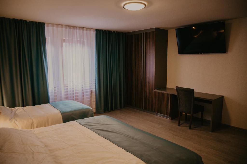 Postel nebo postele na pokoji v ubytování Saray&App