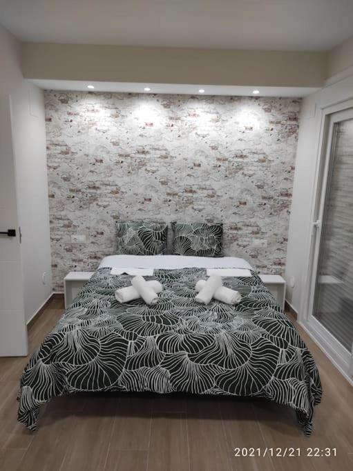 Postel nebo postele na pokoji v ubytování Bonita y amplia casa con patio, en centro ciudad