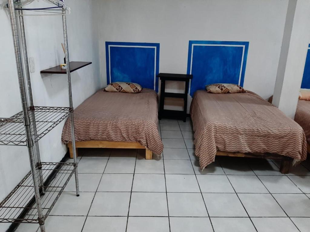 Letto o letti in una camera di Hotelito Ejido