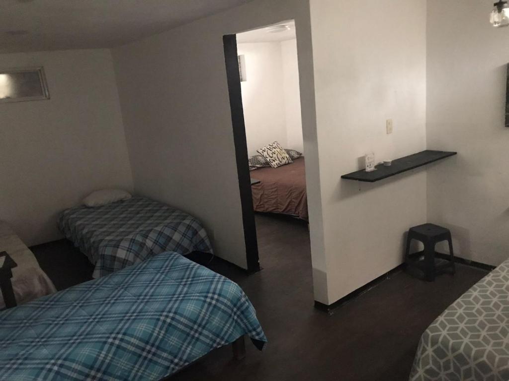 Letto o letti in una camera di Hotelito Ejido