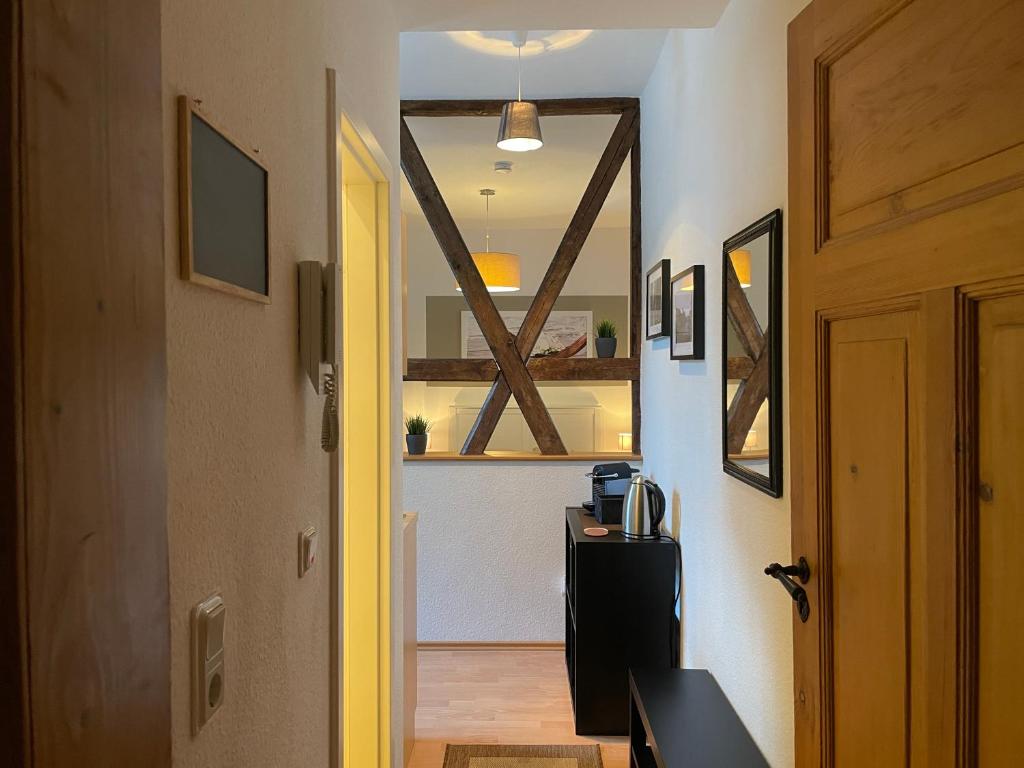 a hallway with a door leading to a room at Ferienwohnung Casa Conti Goslar in Goslar
