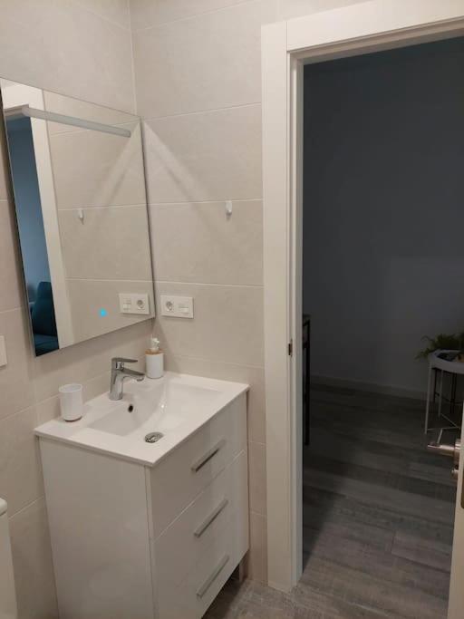 Koupelna v ubytování Punta Prima Palm Beach Apartment
