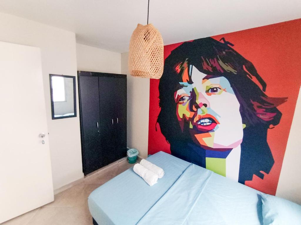 Postel nebo postele na pokoji v ubytování Casa Clandestina Guest House