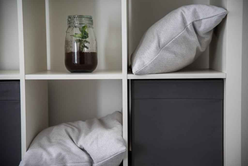 A bed or beds in a room at Ami House Roma