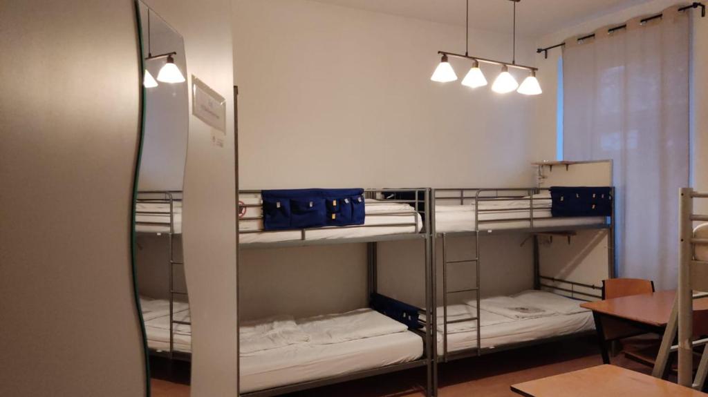 Postel nebo postele na pokoji v ubytování ABAI Apartments 1150 only WWW-On-line-Check-in & SelfService