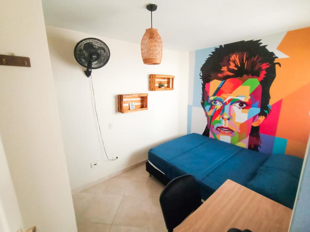 Postel nebo postele na pokoji v ubytování Casa Clandestina Guest House