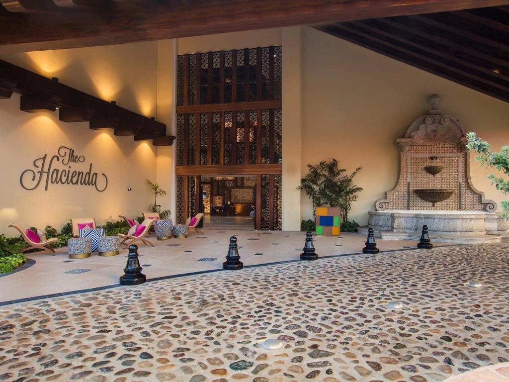 a ball court in a building with chessetts on the floor at The Hacienda at Krystal Altitude Vallarta in Puerto Vallarta