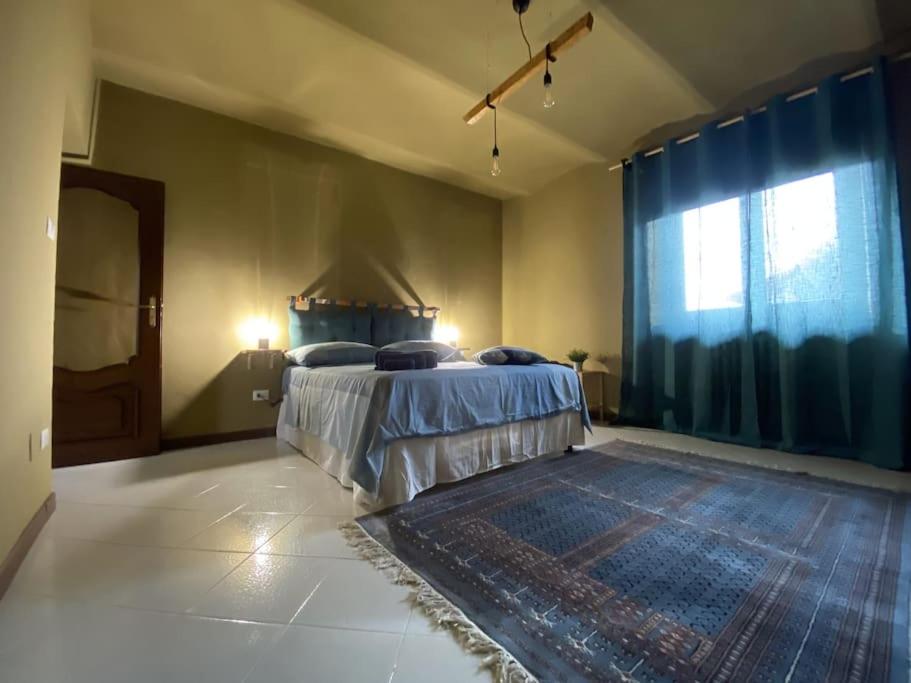 En eller flere senger på et rom på La casa dei Nonni Guest House