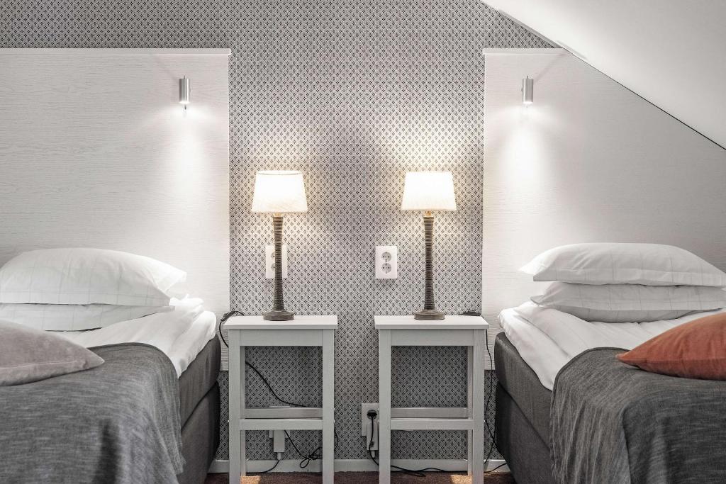 Postel nebo postele na pokoji v ubytování Best Western Plus Edward Hotel