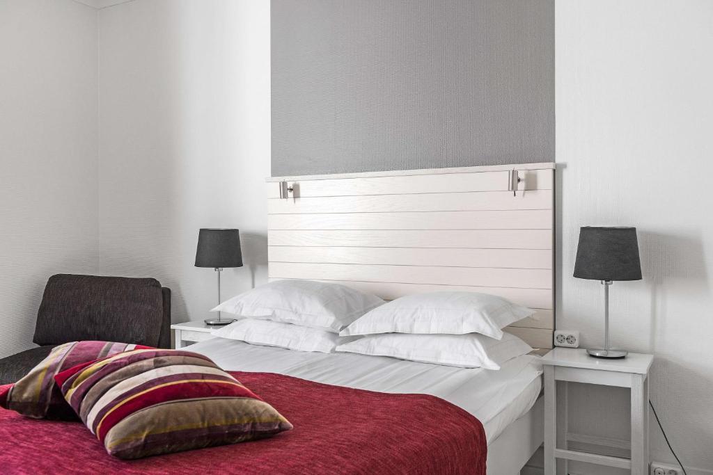 Postel nebo postele na pokoji v ubytování Best Western Plus Edward Hotel