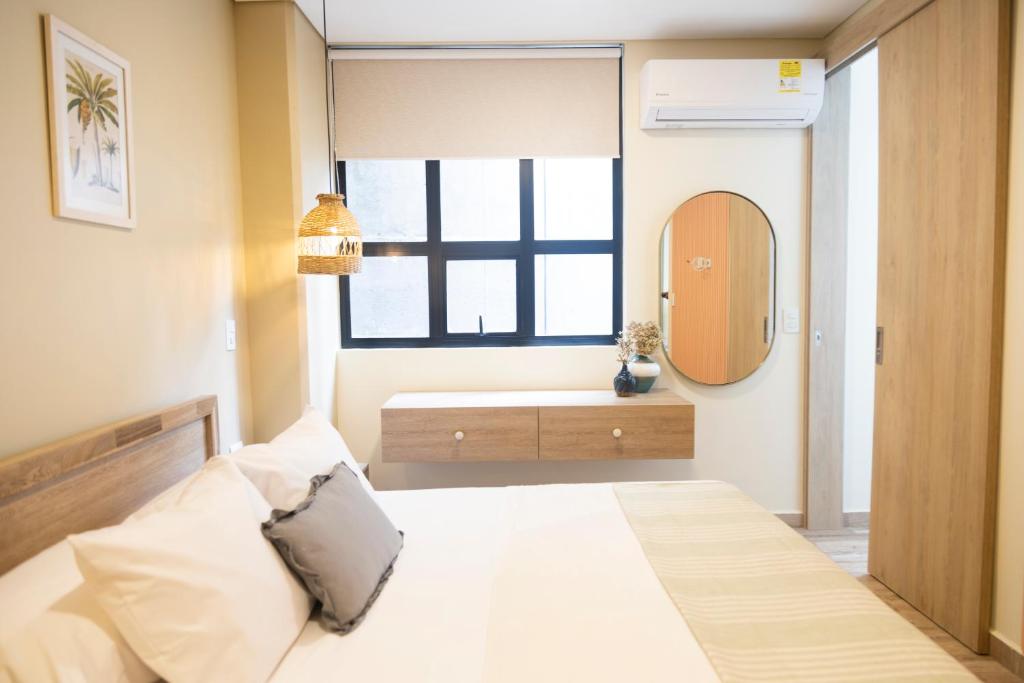 Postel nebo postele na pokoji v ubytování Mythical Hotel Boutique