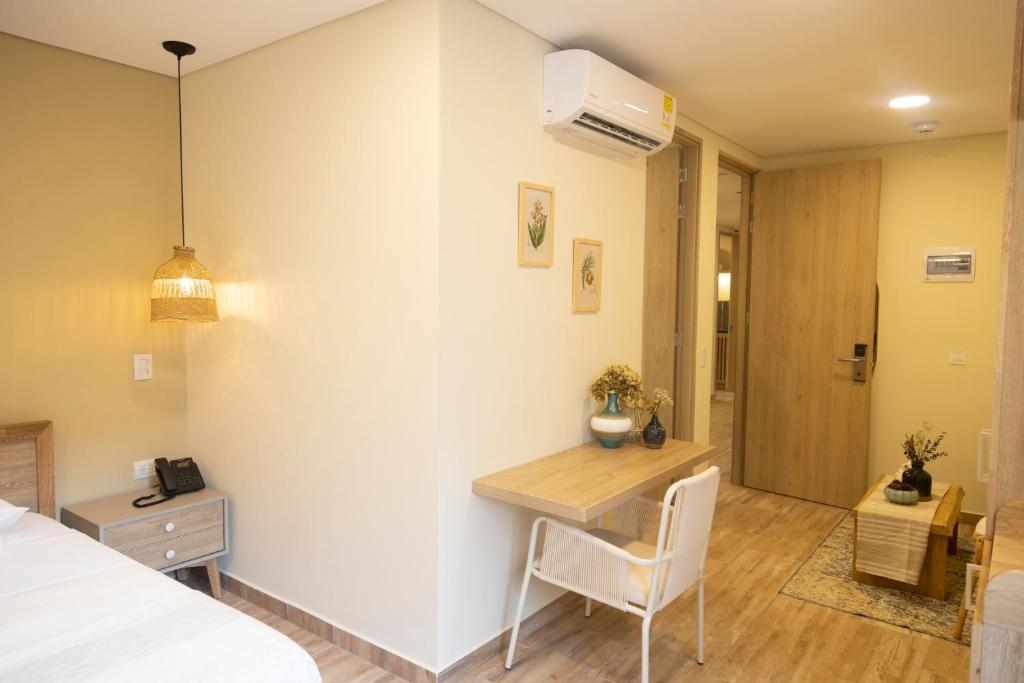 Postel nebo postele na pokoji v ubytování Mythical Hotel Boutique