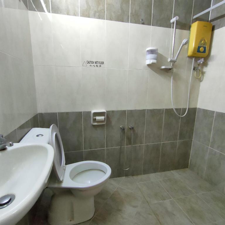 Koupelna v ubytování Cozzy Motel Malacca