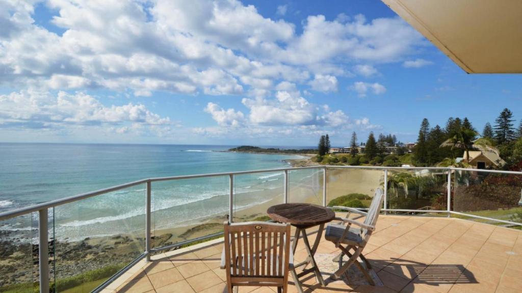 a balcony with a view of the ocean at Lonerock Unit 2 in Yamba