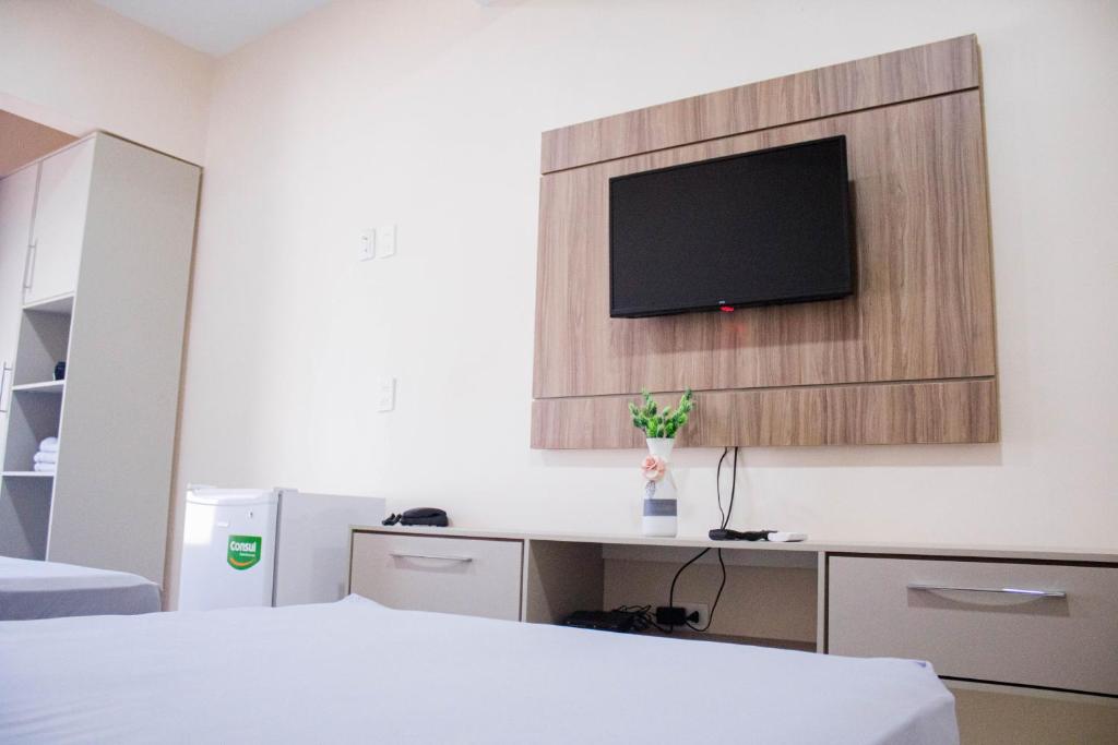 TV a/nebo společenská místnost v ubytování Liebling Hotel Ciudad del Este