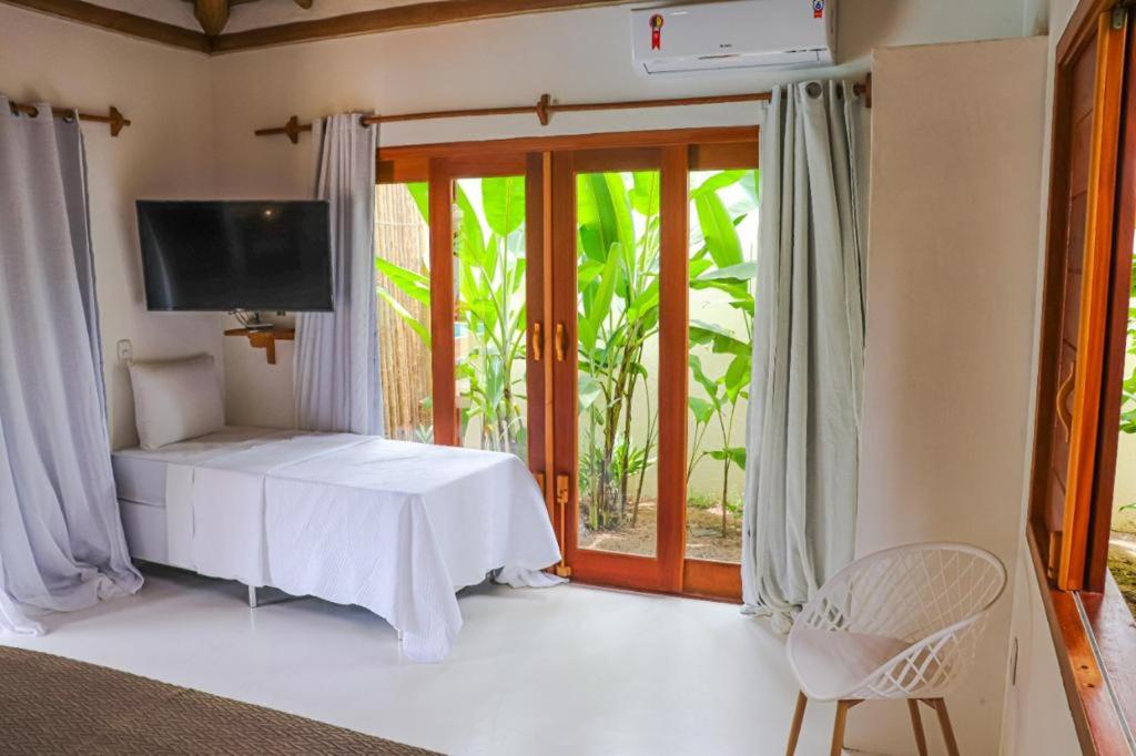 Postel nebo postele na pokoji v ubytování Suites Taipe