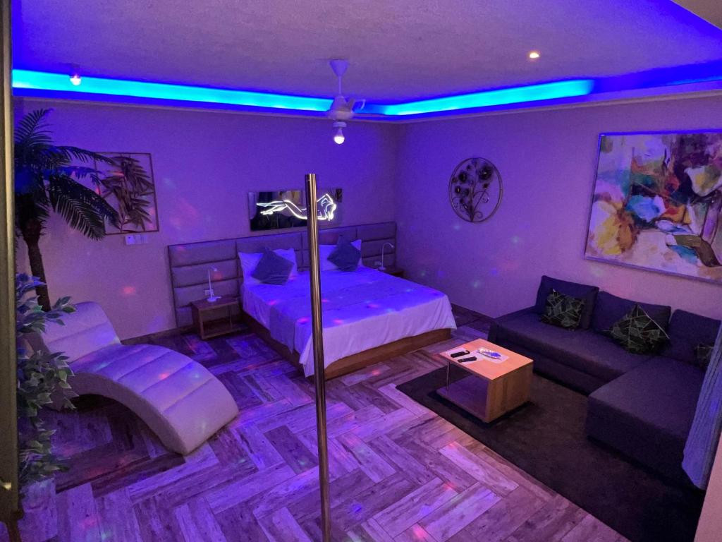 Postel nebo postele na pokoji v ubytování Sosua Inn Hotel