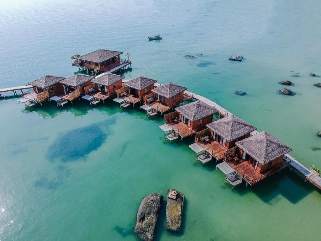 an aerial view of a resort in the water at Rocks Beach Boutique in Phu Quoc