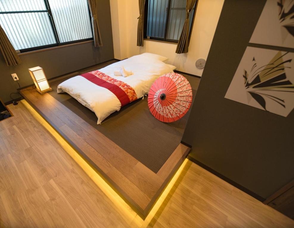 Ліжко або ліжка в номері 匯金・押上ビル