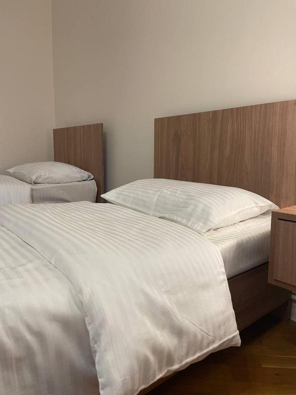 Postel nebo postele na pokoji v ubytování ECO PARK RESORT