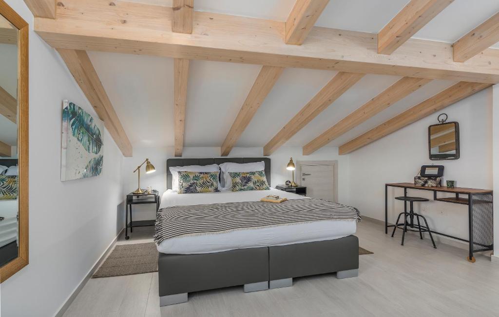 Posteľ alebo postele v izbe v ubytovaní Apart Residence-Galant
