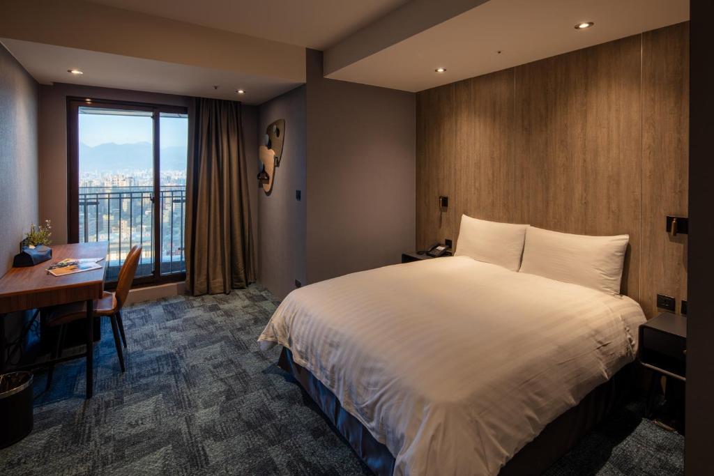 Postel nebo postele na pokoji v ubytování Roaders Plus Hotel - Taipei Station