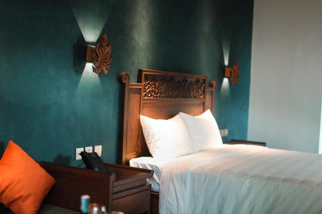 Postel nebo postele na pokoji v ubytování Amour Resort Bavi
