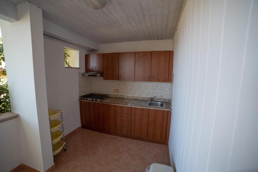A kitchen or kitchenette at Residence New Paradise