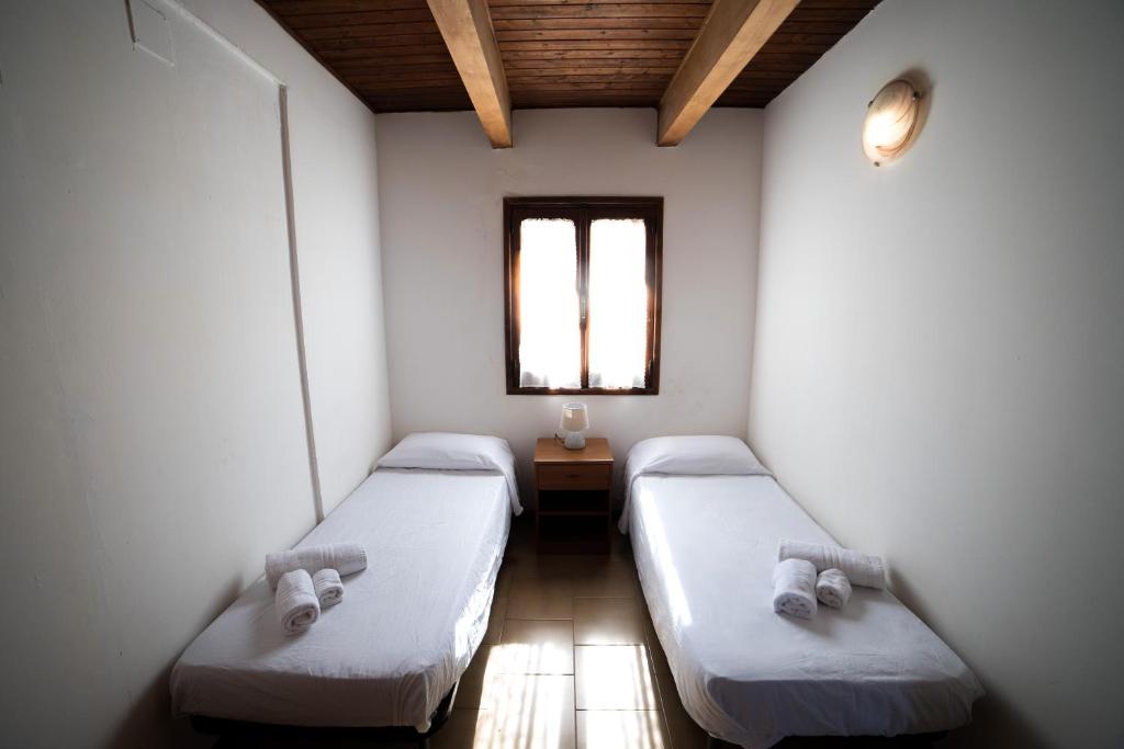 A bed or beds in a room at Residence New Paradise