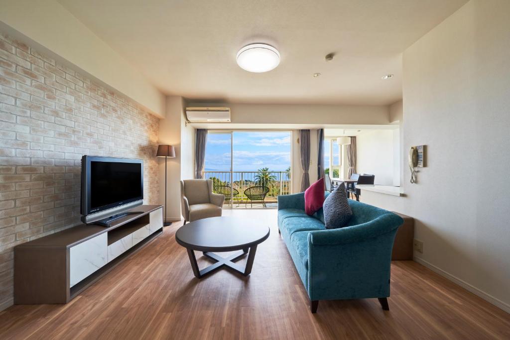 TV a/nebo společenská místnost v ubytování Hotel Village Izukogen